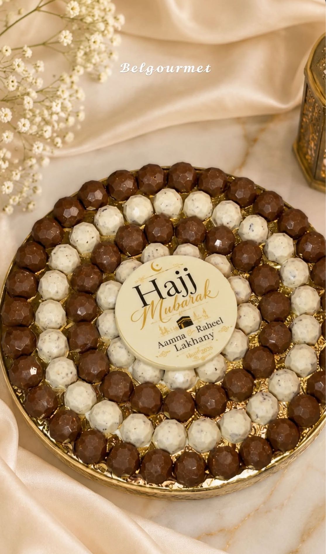 BelGourmet chocolate celebration tray arranged on champagne satin